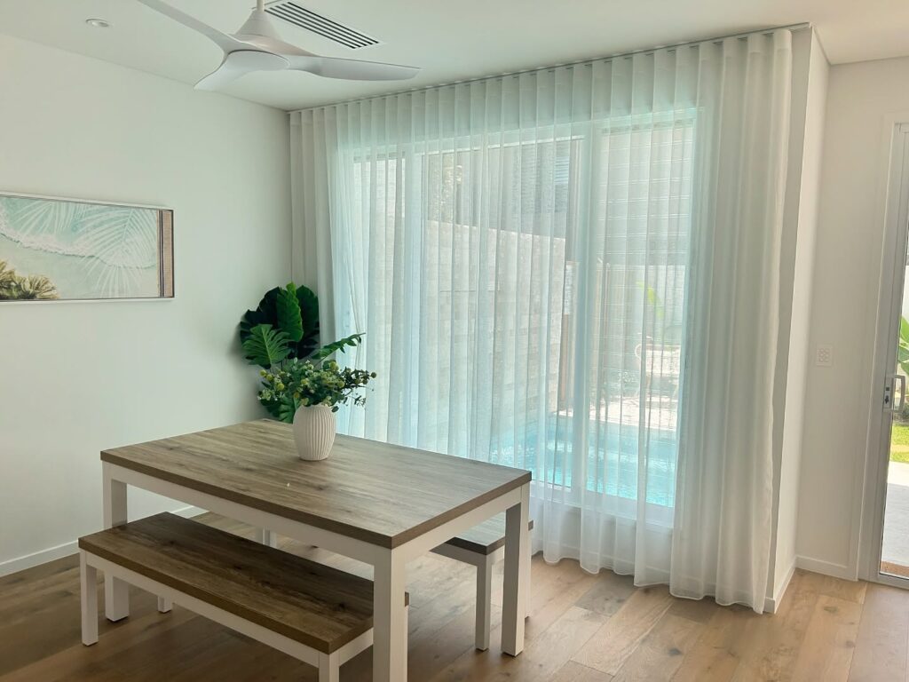 custom made wave curtains for dining room by blinds shop in al barari