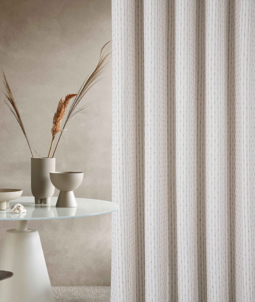 A BEAUTIFUL NATURAL TEXTURED EYELET CURTAINS BY DUBAI BLINDS