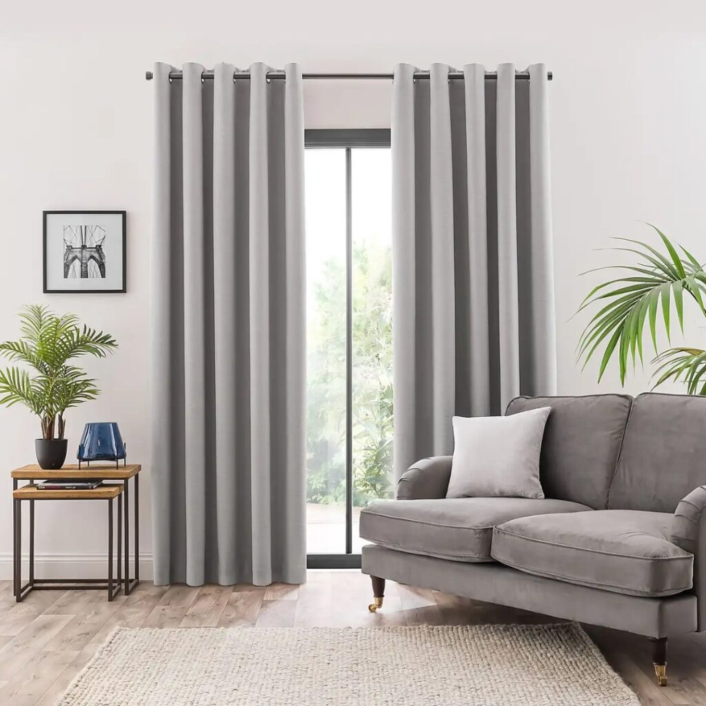 GREY COLOUR BLACKOUT CURTAINS FOR LIVING ROOM AND OFFICE BY DUBAI BLINDS WITH SOFA UPHOLSTERY SERVICES